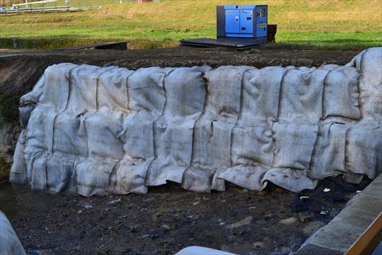 Large-scale sandbag covering for riverbank disaster restoration, Hiroshima Prefecture (1016)